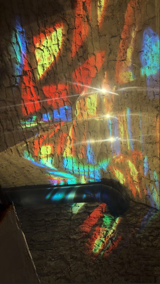 Refracted color across raw stone