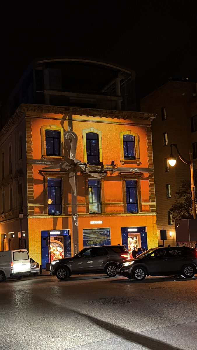 The building lit but unmapped, downtown street