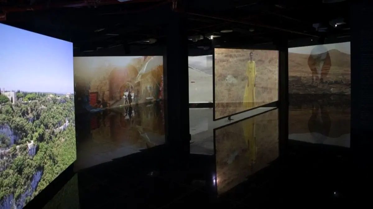 Multi-projection room wide — fashion and heritage layered