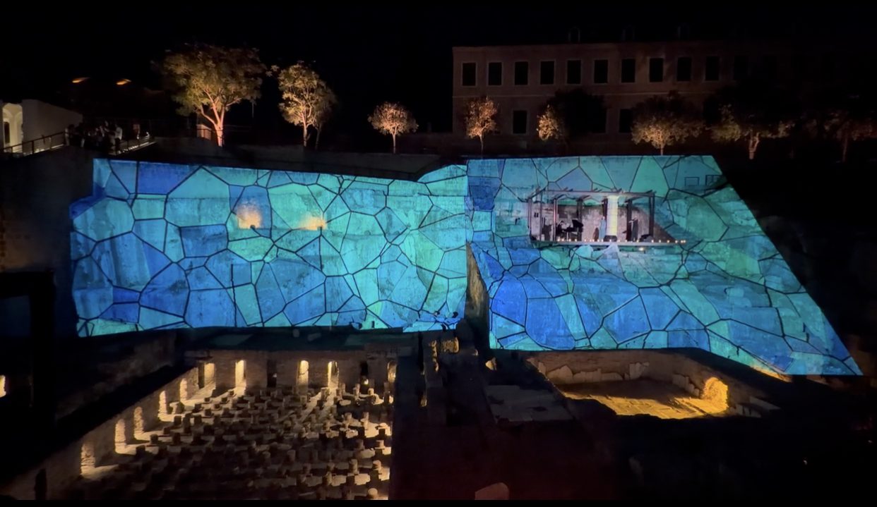 Cool refractive water mosaic across the original bath floor
